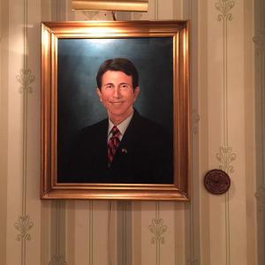 This is the governor's official portrait and hangs in the state capital