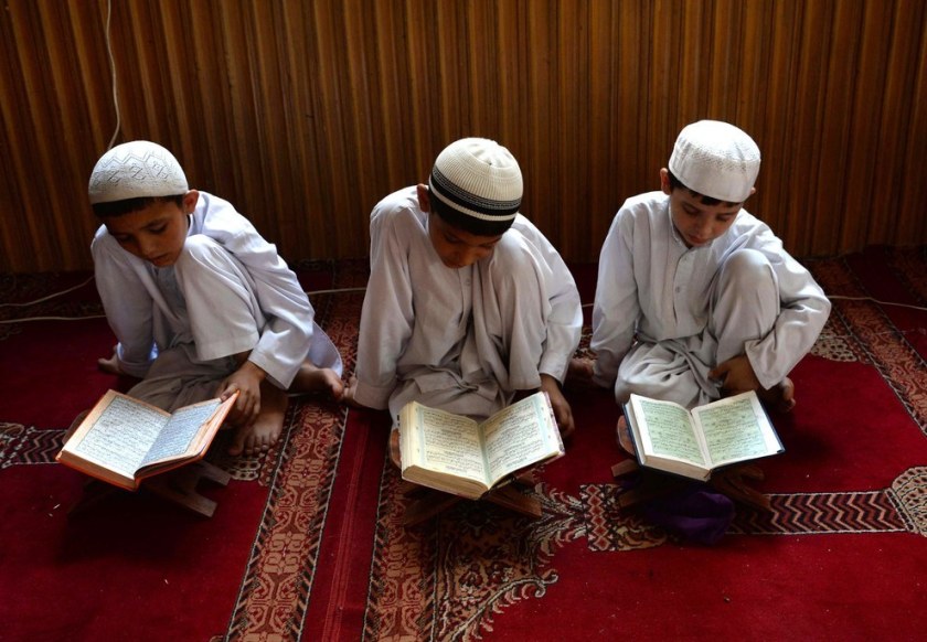 Afghan children study the Quran during first day of the month of Ramadan at a mosque in Jalalabad. Noorullah Shirzada / AFP / Getty Images 