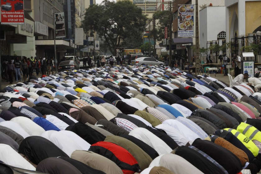 Kenyan Muslim men pray on the first Friday of Ramadan, at Jamia mosque in Nairobi, Kenya.  Khalil Senosi / AP