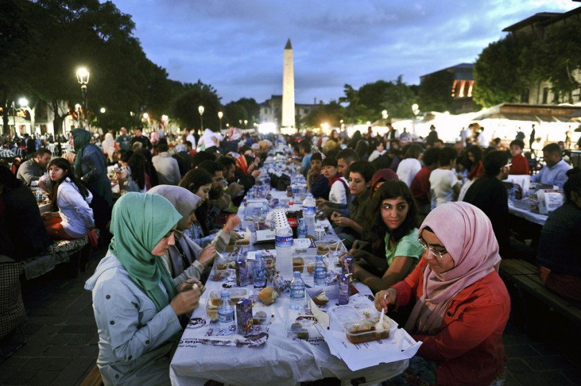 Thousands of Turkish people break their fasting at the Blue Mosque square in Istanbul, during the first day of the holy month of Ramadan. Ramadan is sacred to Muslims because it is during that month that tradition says the Qur’an was revealed to the Prophet Mohammed. The fast is one of the five main religious obligations under Islam. Ozan Kose / Getty Images
